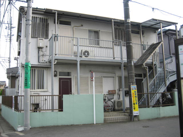 Building appearance. It is a bus stop in front of eyes