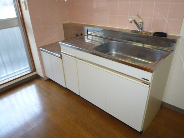 Kitchen. It is a photograph of the same type of room