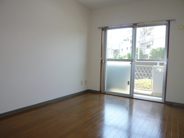 Other room space. It is a photograph of the same type of room