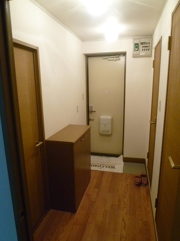 Entrance. It is a photograph of another room of the same properties