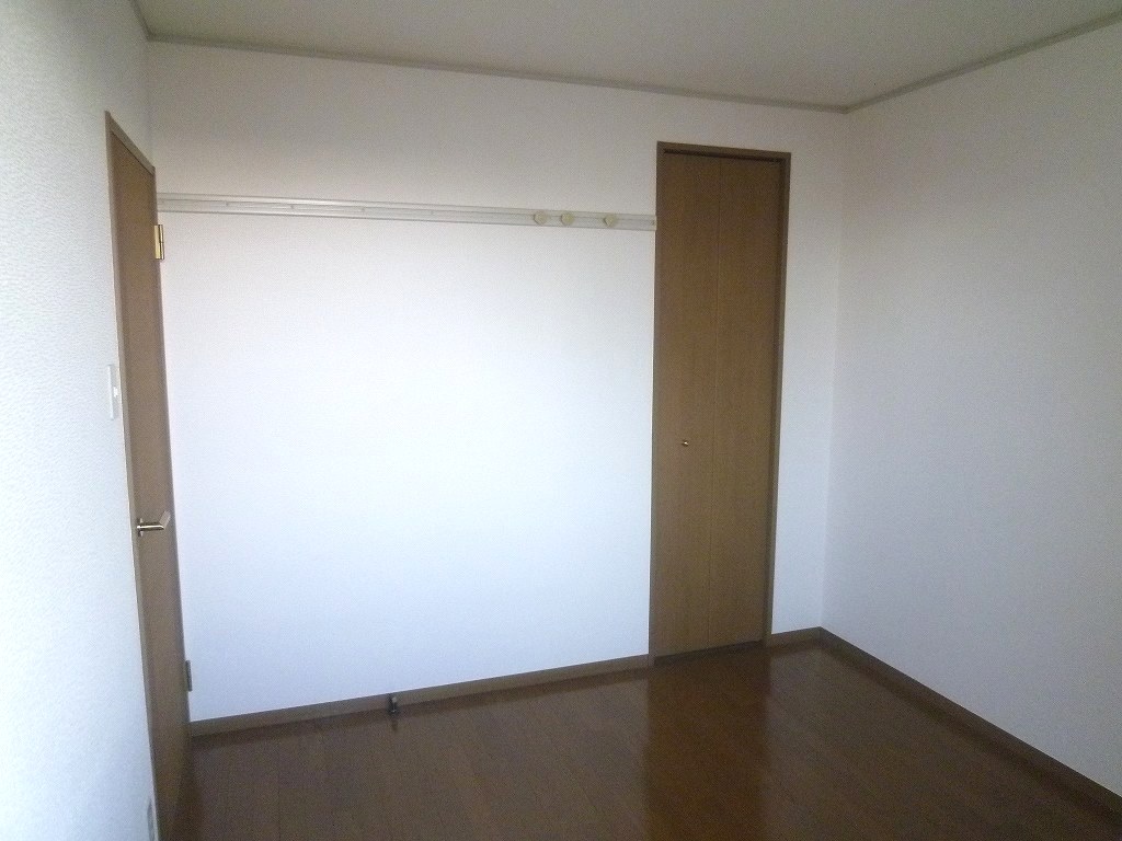 Other room space. It is a photograph of another room of the same properties