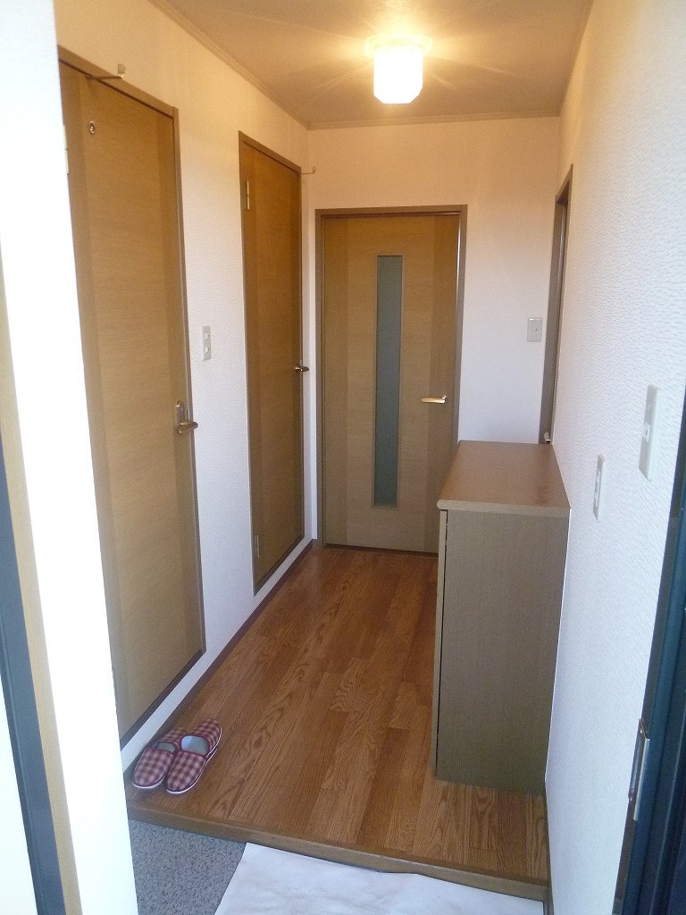 Entrance. It is a photograph of another room of the same properties