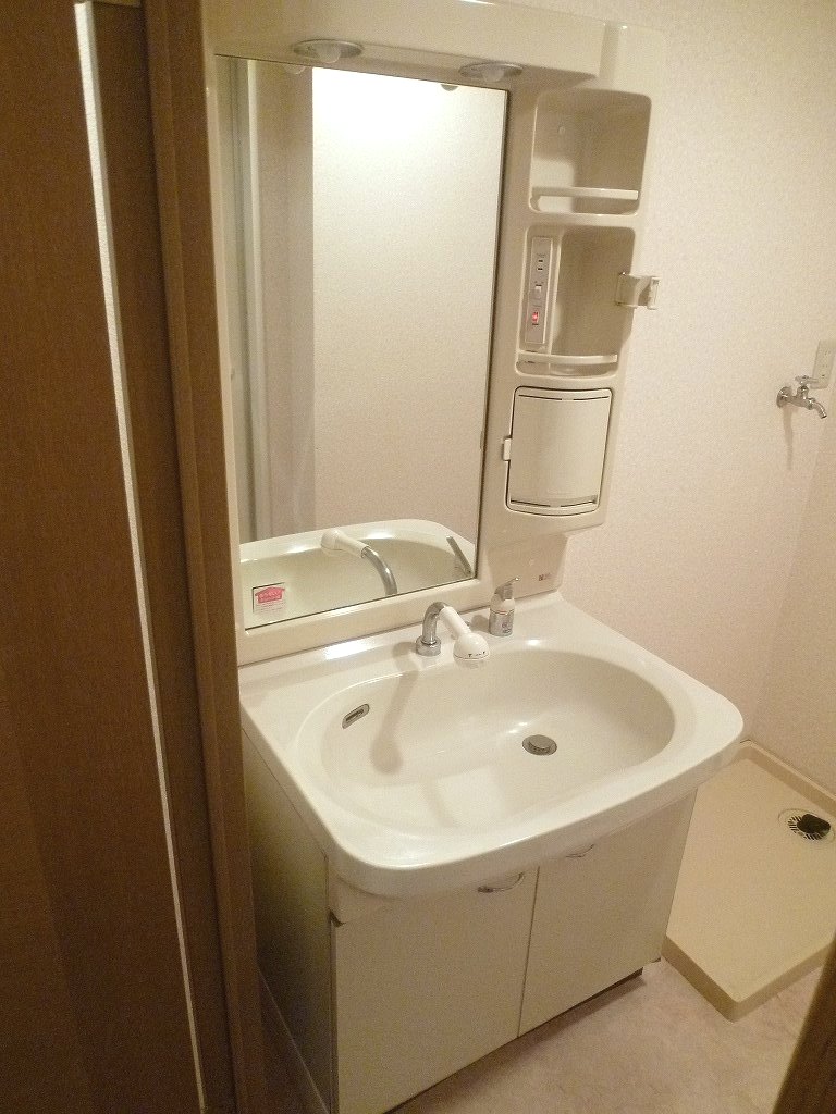 Washroom. It is a photograph of another room of the same properties