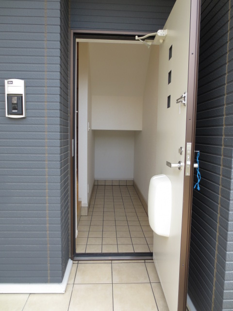 Entrance. It is a photograph of another room