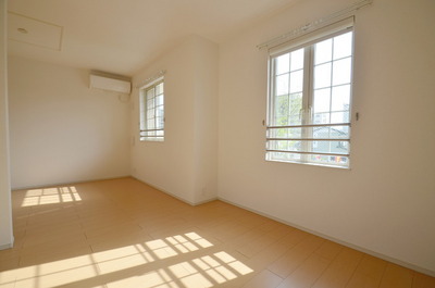 Living and room. It is a bright living because there are many lighting surface!