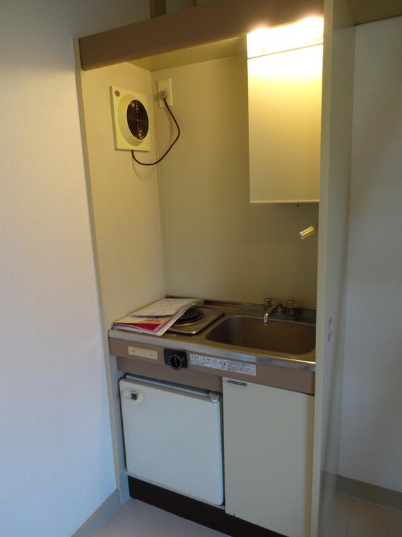 Kitchen. A kitchen with a mini-fridge