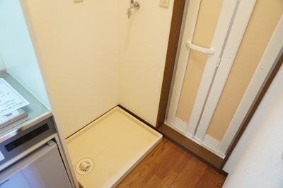 Other Equipment. Washing machine in the room