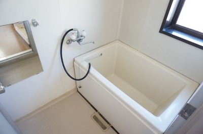 Bath. It is a bathroom with windows