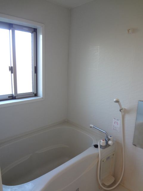 Bath. White is a spacious bathtub with clean which was the keynote.