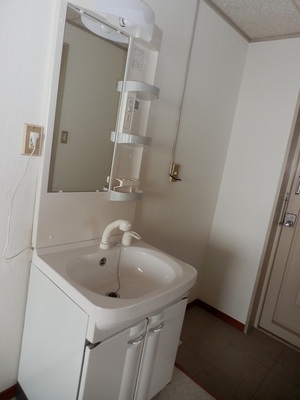 Washroom. Storage rack is useful Dresser!