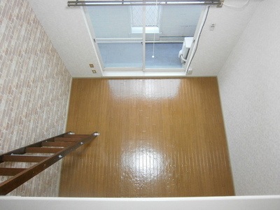 Living and room. I looked down at the living room from the loft