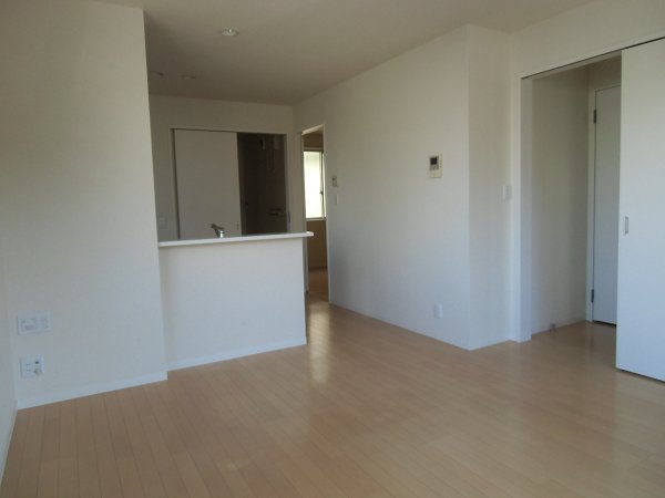 Living and room. Because the corner rooms have windows two places in the living.