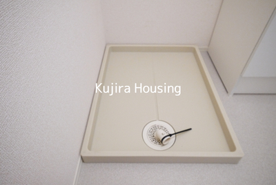 Other. Washing machine storage is attached to the dressing room