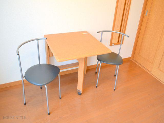 Living and room. Table is folded into a compact to wall
