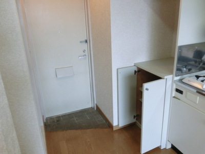 Entrance. It is the entrance with a shoebox