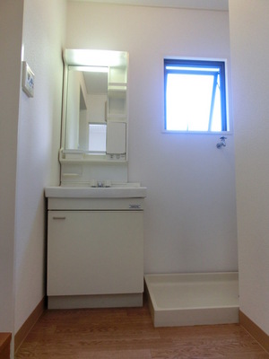 Washroom. It is a wash basin with storage accessories