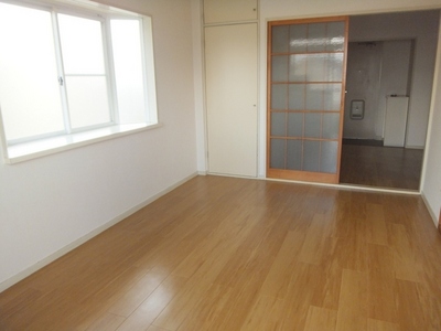 Living and room. There is a bay window is bright rooms