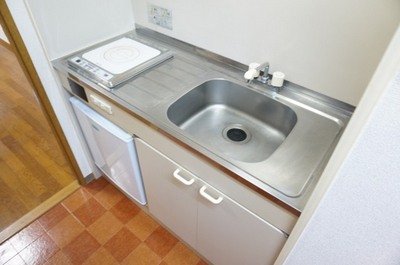 Kitchen. It comes with a refrigerator! 