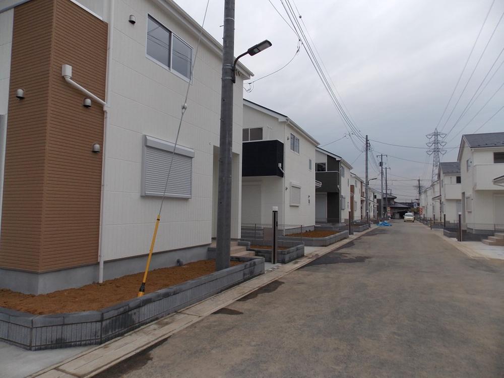 Local photos, including front road. 8 Building