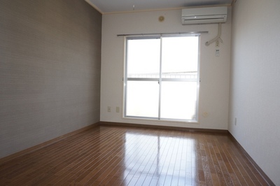 Living and room. One surface wallpaper is accented with cross