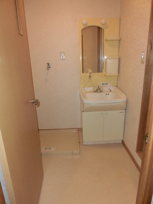Washroom. With separate wash basin, Laundry Area is also housework is likely to be in next door!