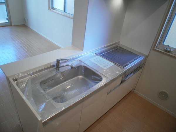 Kitchen. Mirror is a photo of the same type.