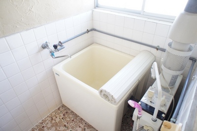 Bath. It is a bathroom with a window