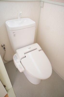 Toilet. Toilet is equipped with Washlet