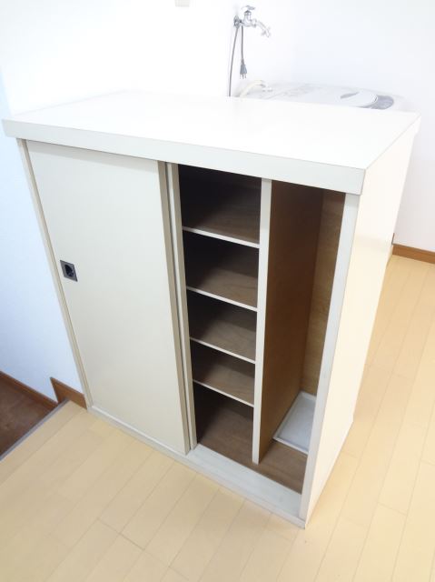 Other Equipment. Bad hair and happy shoe box!