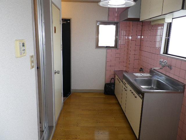 Kitchen. There is a window in the kitchen, You can ventilation.