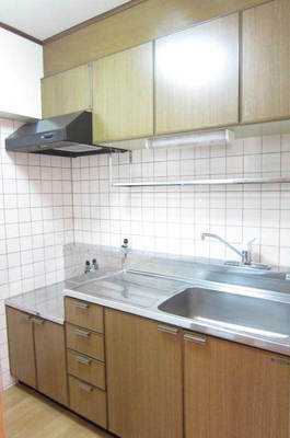 Kitchen. There is also a gas stove is installed type storage rack