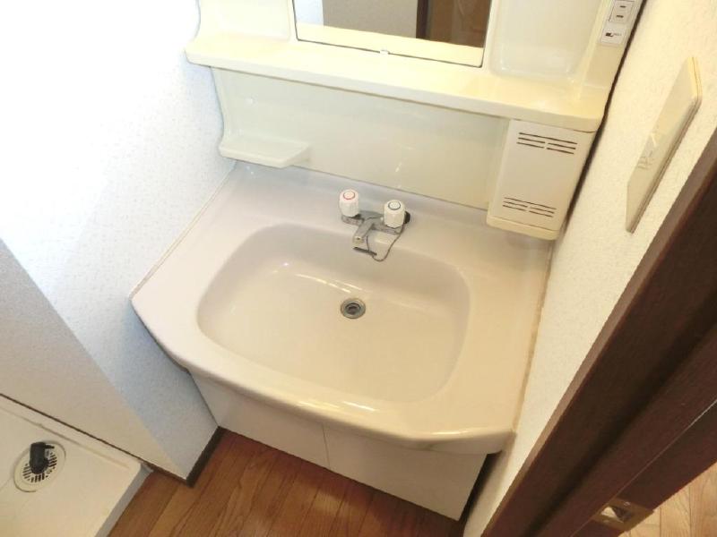 Washroom. Wide is a wash basin of the sink