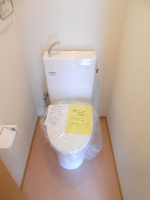 Toilet. I'm happy with warm toilet!