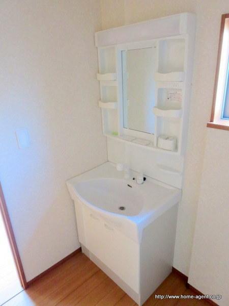 Wash basin, toilet. It puts things a lot