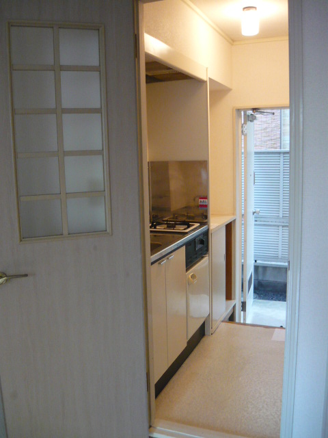 Living and room. Hallway is the kitchen space. 