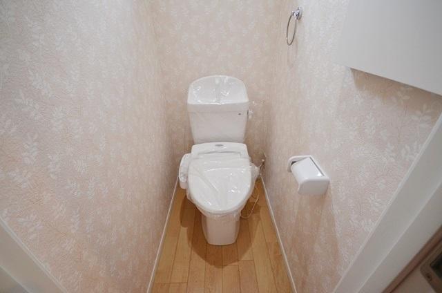 Toilet. Second floor toilet with warm water washing toilet seat.