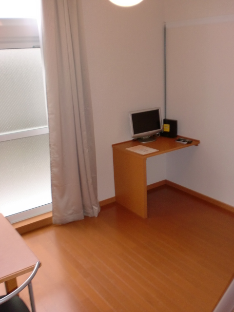 Living and room. The photograph is a first floor. The second floor will be the carpet.