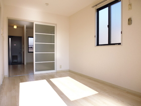 Living and room. It is a corner room
