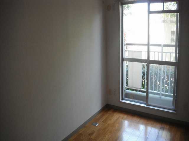 Other room space. The window is large airy pat