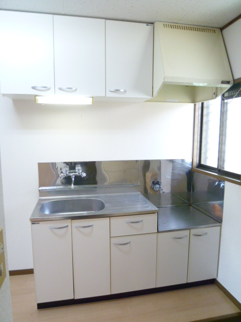 Kitchen. Also put with a two-burner stove grill