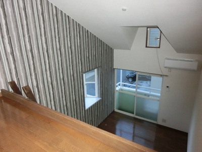 Living and room. And overlooking the room from loft.