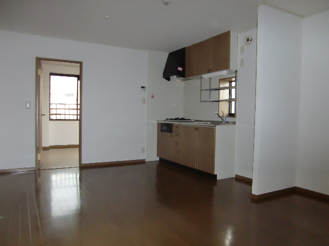 Living and room. It will be the corner room photo