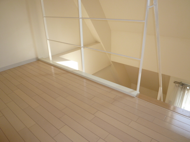 Living and room. It is a photograph of another room