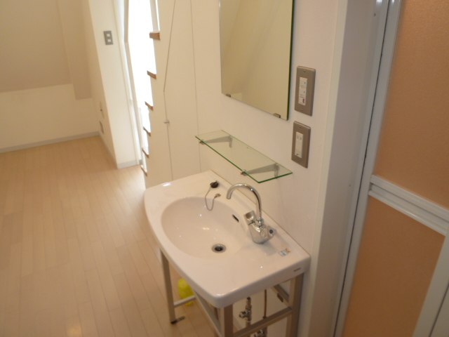 Washroom. It is a photograph of another room