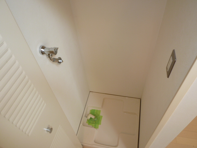 Other Equipment. Laundry Area (It is a photograph of another room)