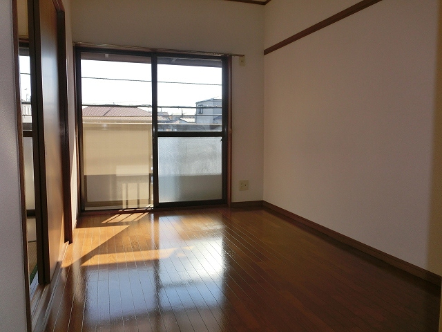 Other room space. It is a photograph of another in Room