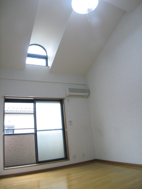 Living and room. Because the skylight is attached, Good per sun!