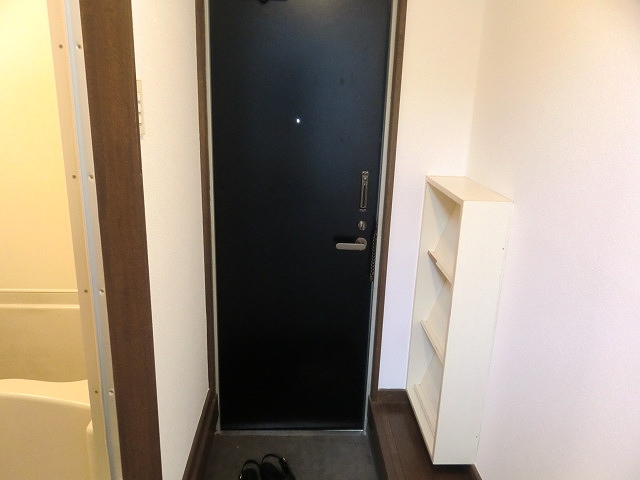 Entrance. It is a photograph of another room. 