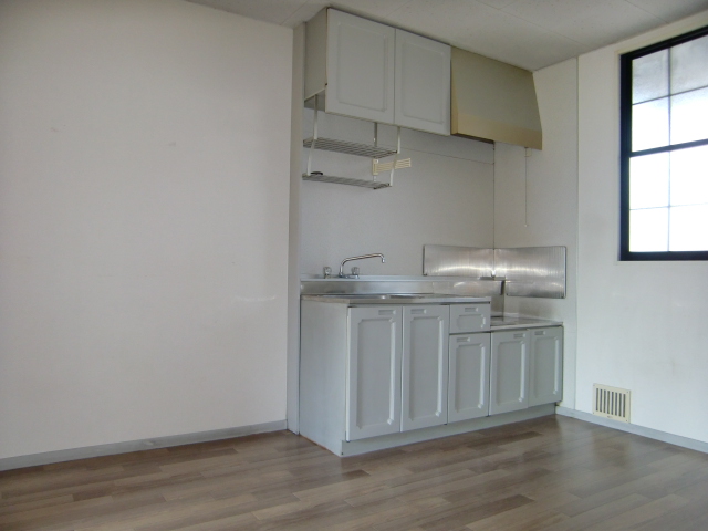 Living and room. It will be in a room photo of the same type 1F.