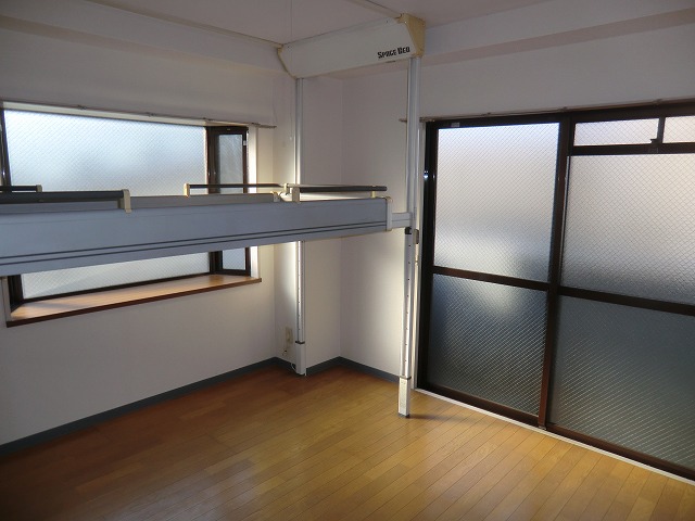 Living and room. It is a photograph that was down the electric bed